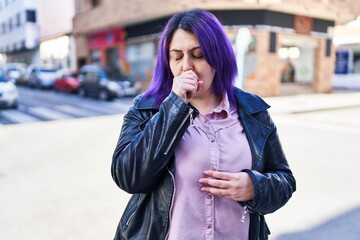 Fototapeta premium Young beautiful plus size woman coughing at street