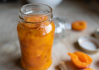 Fototapeta na wymiar Pickled apricos in a jar