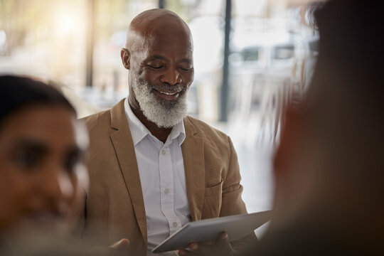 Black Man, Tablet Or Boss In Meeting For Business Growth, Strategy Or Collaboration On Project In Office. Happy CEO, Digital Startup Or African Senior Manager Planning Or Working On Online Marketing