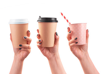Several female hands holding up a coffee paper cup on white background. Front view