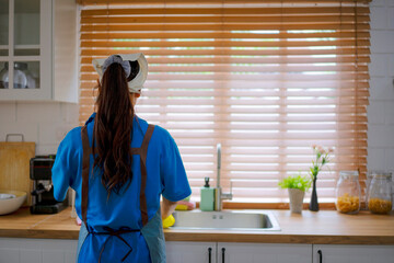 House keeper clean kitchen.