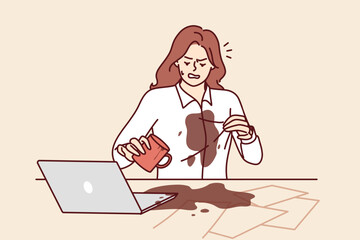 Woman spilled coffee on shirt doing office work and sitting at table with laptops and documents. Clumsy girl spilled hot drink on table due to carelessness or tiredness after long work - obrazy, fototapety, plakaty