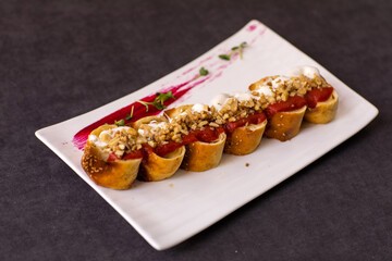 Baked appetizer filled with fish.