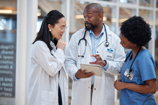 Medical, team and doctor planning research in a hospital and talking about results as teamwork communication. Discussion, healthcare and professional group speaking about medicine strategy in clinic