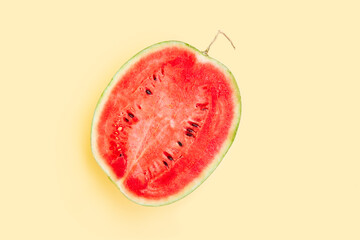 Watermelon fruit sliced half  isolated on yellow background, Organic fruit, Ripe watermelon