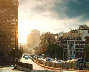 Egypt, Cairo - 15th May Bridge with Buildings and Cars, Sunset , Sun Flare, Road.