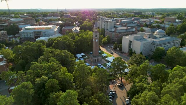 UNC clock tower drone flyover North Carolina Chapel Hill late summer afternoon