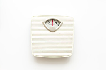 White floor weight scales top view. Body weight control and slimming concept