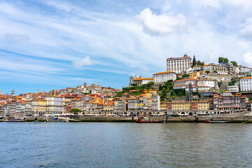 Fototapeta na wymiar Beautiful colorful building facede in Porto Portugal next to Duero river in Ribeira