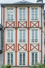 Obraz premium Morlaix, Brittany, France - 2022 August 21: Traditional French facade of a town house located in Morlaix, Typical houses of French Brittany
