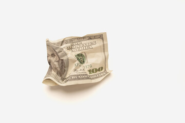 The Financial Crisis in the United States. Falling currency and crumpled American dollar banknotes.