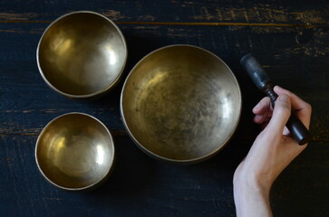 Tibetan singing bowls with stick music instruments for meditation, relaxation, yoga, massage, soundhealing