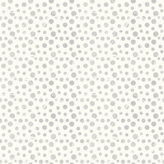 Seamless simple polka dot pattern. Grey polka dots on a light background.