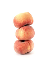 Close up shot of three wild peaches, isolated