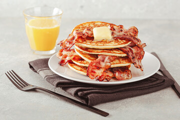 sweet pancakes with butter and bacon. traditional american breakfast