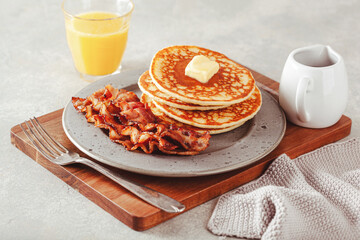 sweet pancakes with butter and bacon. traditional american breakfast
