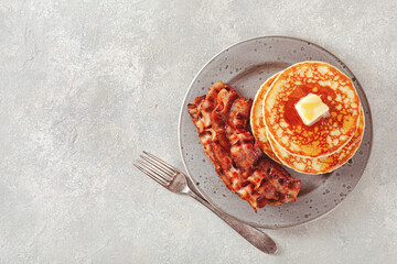 sweet pancakes with butter and bacon. traditional american breakfast