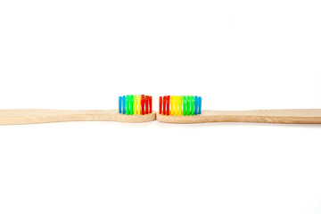 Bamboo toothbrush on a white background. Prevention of dental plaque and caries. Oral care. Dentistry concept.