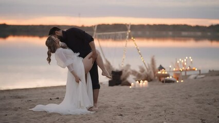 Multiethnic Lovers Embracing And Kissing Passionately On Beach In Sunset, Romantic Wedding Couple