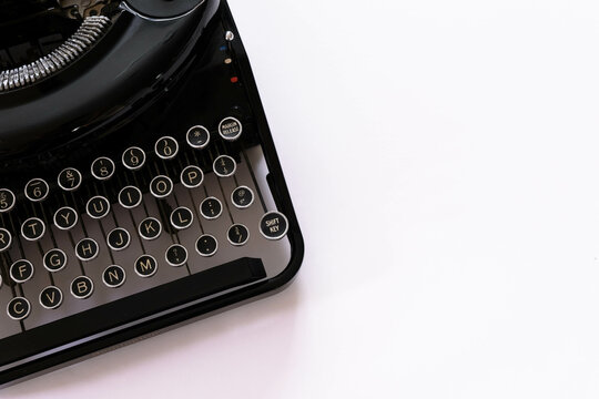 Old mechanical typewriter and pure white background