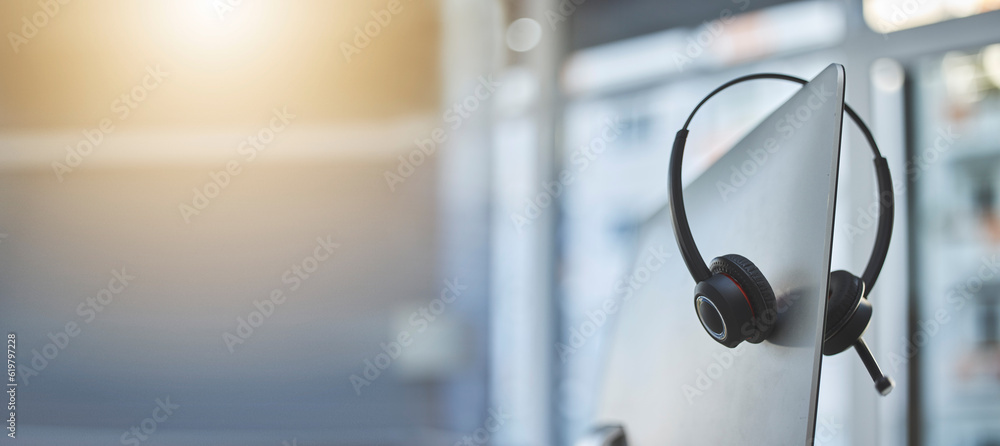 Poster call center, headset on a computer in an empty office with flare and mockup for communication or ass