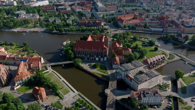 Wrocław Old Town. 4k aerial footage view of the Oder River, old center of the city of Wroclaw in Poland. Summer scene. View of the cathedral island in the evening. 