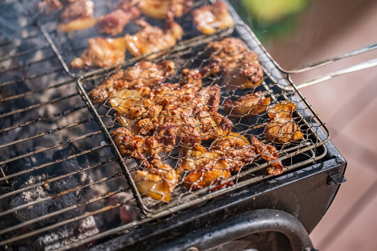 Grilled meat live on charcoal fire. The ingredient of "bun cha" is a famous Vietnamese noodle dish