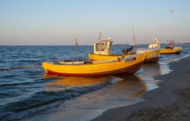 Naklejka na ściany i meble Fishing boats on the beach of Baltic Sea in Poland.