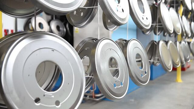 Powder coating line, painting products in an electrostatic field.