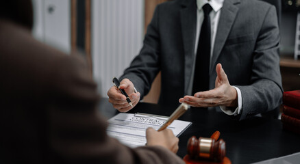 Fototapeta premium Business people and lawyers discussing contract papers sitting in the table at office in the morning. concepts of law, advice, legal services.