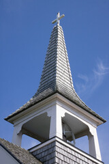 Obraz premium Church Bell Tower with a cross