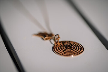 Luxury Gold and Diamond Jewelry includes an antique and beautiful round brooch in gold, as well as...