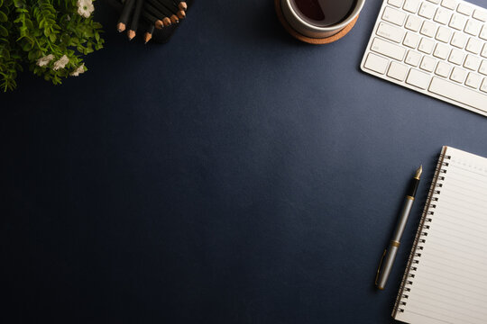 Flat Lay Laptop Computer, Smart Phone, Coffee Cup And Stationery On Table With Copy Space.