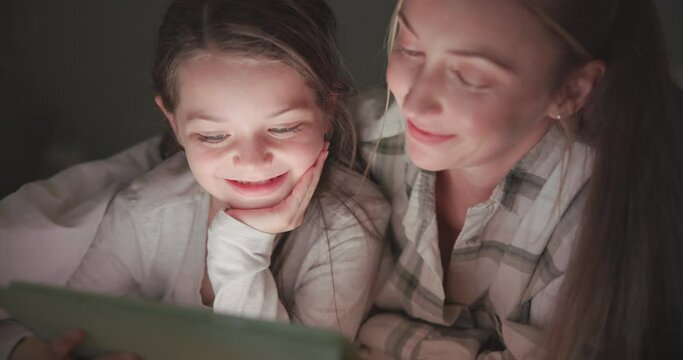 Tablet, kiss and mother with daughter in bedroom for storytelling, streaming and watching movies. Happy, internet and technology with woman and girl in family home for subscription, online and media