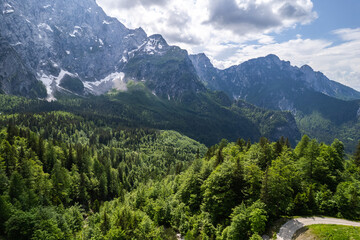 Fototapeta premium Alpine mountains landscape. Aerial drone view Beauty in nature. Italian Alps