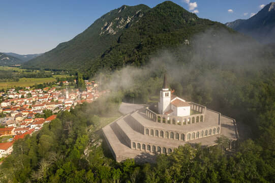 Drone view of St Anton Church and Kobarid Ossuary in Slovenia. Caporetto Memorial from First World War