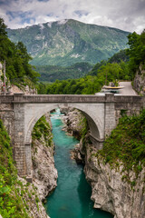 Fototapeta na wymiar Napoleon Bridge near Kobarid over Soca river in Soca Valley, Slovenia