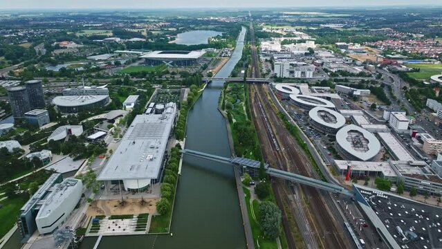 Drone shot of Wolfsburg city , Germany . It's known as the headquarters for Volkswagen and for the Autostadt, an automobile-themed park with a classic-car museum and driving track.