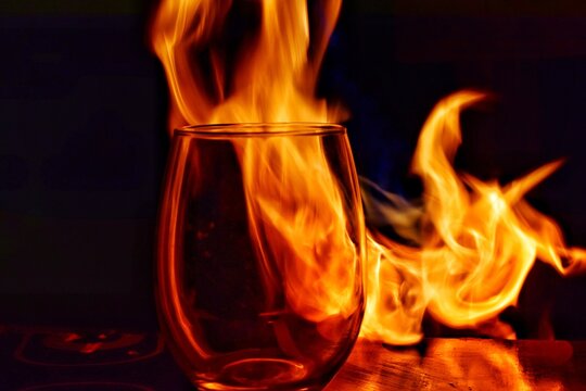 The flame through the glass