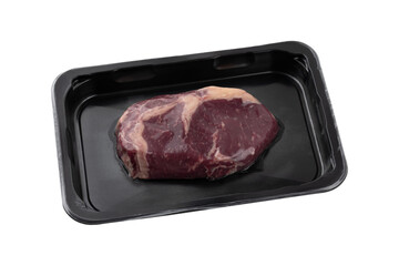 Vacuum-packed steak on a white background. A piece of vacuum-packed beef close-up on a white background.