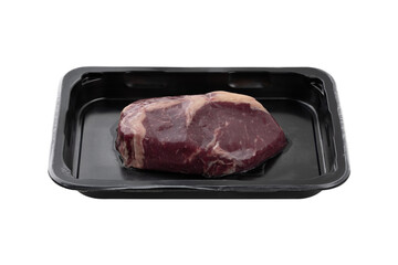 Vacuum-packed steak on a white background. A piece of vacuum-packed beef close-up on a white background.