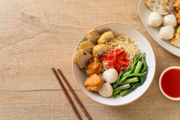 egg noodles with fish balls and shrimp balls in pink sauce, Yen Ta Four or Yen Ta Fo