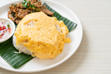 egg on topped rice with grilled pork and spicy sauce