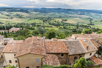 Obraz premium Scenic and picturesque view of Tuscany countryside rolling hills and farmland from above ancient city of Montepulciano