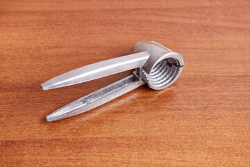 The Nutcracker is lying on the kitchen table. Kitchen appliances for work in the kitchen.