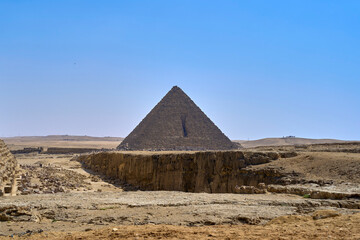 Fototapeta na wymiar Pyramid of Menkaure as seen from a distance. The Great Pyramids of Giza, Giza Plateau, Cairo, Egypt