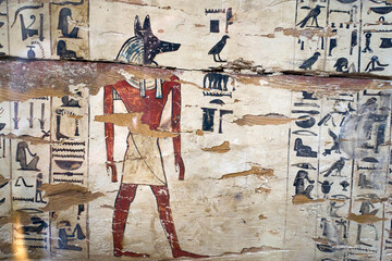 Painted depiction of Anubis god of the dead on a wooden crate - obrazy, fototapety, plakaty