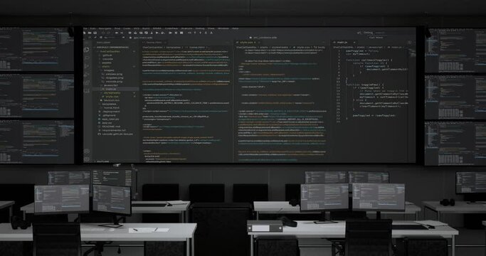 Programming Code Moving On Big Black Screen Background Horizontal With Multiple Monitors And Desktops Showing Database In A Control Security Center Room At The Office 
