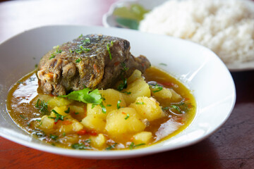 Majaz stewed. The majaz or paca is a species of rodent for meat that is highly valued and commonly consumed in the Peruvian jungle.
