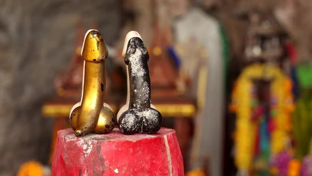 Wooden penis in Princess cave (Phra Nang Shrine Temple). South Railay beach in Krabi. Thailand.
